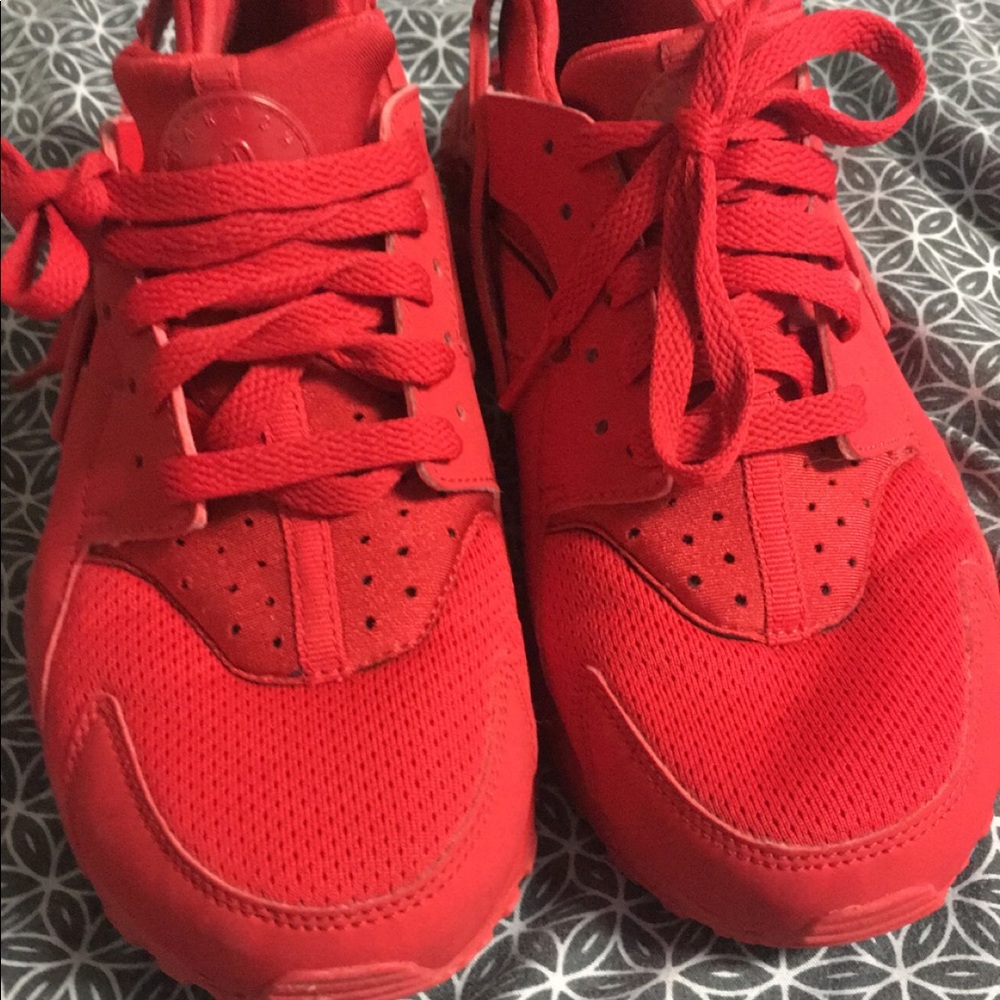 All red youth Nikes